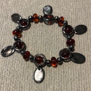 Women's Amber Colored Glass Bead Charm Bracelet With Silver Tone Charms